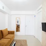 Cozy 2Br Bassura City Apartment With City View By Travelio